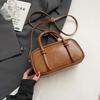 Bolsos de otoño e invierno para mujer 2024, nuevo bolso de hombro, bolso de bolos de moda popular, bolso de mano Maillard, bolso cruzado