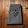 Pantalones casuales rectos holgados de algodón de fibra larga finos de alta gama para hombre, cómodos, combinan con todo, de negocios, sin planchado, primavera y verano 2023