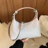 Bolso de mano tipo dumpling coreano de nicho transfronterizo para mujer 2026 nuevo súper popular de moda para el día a día bolso de hombro cruzado