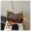 Bolso de Cadena de Nicho Estilo Francés para Debajo del Brazo para Mujer, Nuevo Bolso de Media Luna de Moda para Comercio Exterior Transfronterizo, Bolso Versátil de Hombro y Cruzado