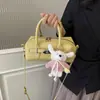 Diseño único, nueva colección de verano, bolso de hombro para mujer de color liso, versátil y elegante, perfecto para ir al trabajo, con un aspecto de alta gama y un toque de personalidad