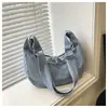 Bolsa jeans feminina 2026 nova primavera estudante aula trajeto bolsa de ombro única grande capacidade transversal bolsa de bolinho