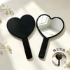 Espejo de mano en forma de corazón disponible en stock del fabricante, espejo de maquillaje portátil en forma de corazón, regalo promocional corporativo creativo, espejo de belleza al por mayor