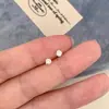 Elegantes pendientes de botón de perla sintética y circonita para mujer, pendientes versátiles de moda de nicho con colgantes de borlas, pendientes colgantes, pendientes de aro y accesorios para las orejas para mujer