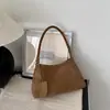 Bolso de hombro tejido versátil de moda retro estilo coreano 2026, un bolso de hombro de alta gama y único que se puede llevar cruzado.