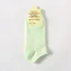 Una generación de calcetines de barco para mujer de primavera y verano, calcetines cortos de algodón de caramelo de color liso para mujer, venta al por mayor