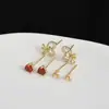 Una tarjeta tres pares de pendientes de combinación de moda lazo simple micro incrustado circonita pasador S925 pendientes al por mayor