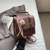 Mochila Estilo Colegio de Comercio Exterior para Mujer 2026 Nueva Moda Primavera Verano Versátil Casual Bolso Cruzado Mochila Pequeña para Estudiante