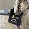 Bolso de mezclilla informal, literario, de estilo coreano, de nicho de celebridades de Internet, versátil, de compras, de lona de gran capacidad y un solo hombro para mujer