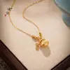 Loja de ouro Puzuo com borla de ouro de areia moeda bolsa da sorte colar olho de gato feminino estilo chinês estilo nacional temperamento moda corrente da clavícula
