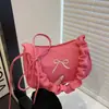 Bolso de Hombro de Diseño de Nicho Estilo Francés Nuevo Modelo 2026 Bolso de Hombro de Color Sólido con Lazo Bolso de Mano Pequeño Simple con Pliegues Venta Caliente