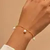 Pulseira de Pérola Sintética em Ouro 18K com Contas Douradas, Corrente de Aço Inoxidável, Corrente Fina Simples, Acessório para o Dia a Dia, Joia Transfronteiriça Europeia e Americana