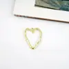 Colgante de joyería con forma de corazón hueco de aleación, pendientes, collar, materiales para producción DIY, comercio electrónico transfronterizo, venta al por mayor de fábrica