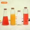 Venta al por mayor de fábrica botella de vidrio para té frío de 350 ml botella de vidrio para bebidas botella de té botella de vidrio para té perfumado botella de té con leche