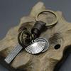 Llavero creativo aleación bronce abanico retro tejido cuero vacuno llavero 156