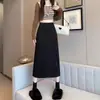 Falda midi línea A moda elástico trasero diseño de abertura talla grande gorda m media falda estilo casual de viajero media falda