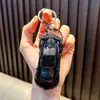 Chaveiro pingente de carro esportivo Huili pingente para bolsa de carro modelo chaveiro liga metálica brinquedo pequeno presente pequeno atacado