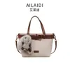 Bolso tipo cubo tote retro casual versátil para mujer, nuevo estilo 2026, de alta calidad, elegante bolso de hombro, bolso cruzado de moda
