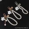 Llavero de Aleación con Colgante de Ángel de Perla Estilo Japonés Colgante para Funda de AirPods Accesorio para Bolso de Estudiante
