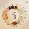Yi Nengjing Pulseira de cristal de sete pulsos com estilo único, superestilo dourado, pedra olho de tigre, cristal de cabelo dourado, pulseira fantasma verde com vários tesouros