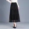 Falda de pastel con retazos de malla, falda midi acampanada para mujer, nuevo estilo primavera y otoño 2026, falda midi plisada de cintura alta elástica