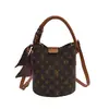 Bolsa de mão feminina de luxo, novo modelo 2026, bolsa saco com monograma estampado mãe-filha, versátil para usar no ombro, transversal e como bolsa de mão para vendas transfronteiriças