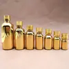 Botella de vidrio dorada galvanizada 5ml10ml multi-especificación botella cosmética de vidrio botella de aceite esencial de vidrio fabricantes al por mayor
