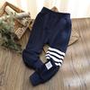Primavera 2026 Calças Casuais de Cor Sólida para Esportes Calça Longa de Tricô de Algodão Cinza Modelagem Solta Casual Roupa Infantil Versátil para Uso Casual