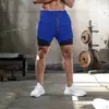 Shorts Esportivos Queimam Músculos Masculino Camada Dupla Combinação de Cores Toalha Pendurada Fitness Corrida Respirável Cor Sólida Calças Amazon
