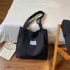 Bolsa Tote de Lona Grande Capacidade Estilosa Fresca Simples Artística Casual Estudante Ombro Único de Mão Outono 2026