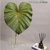 Nueva simulación de plantas verdes fabricantes de comercio exterior sienten hojas grandes trepadoras verde terciopelo rojo neto hojas planta pared flor arte atuendo suave