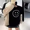 Camiseta de seda de leche estilo coreano de verano para pareja con estampado de cara sonriente blanca, casual, holgada, de manga corta, para ir al trabajo