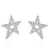 Elegantes pendientes de lujo de alta gama con forma de estrella asimétrica de cinco puntas, pendientes creativos de estrella con circonita brillante