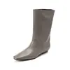 La primera capa de piel de vaca tacón de cuña botas nuevo estilo coreano punta cuadrada manga tacón bajo minimax botas de moda talla grande mujer botas individuales