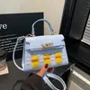 2026 Gran Capacidad Lujo Ligero Hebilla Casa Pequeña Sin Espinas Nuevo Simple Retro Bolso de Mano para Viajes Diarios Bolso de Hombro Bolso Cruzado