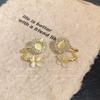 Pendientes de lujo ligeros y elegantes con forma de ojo de gato, de alta calidad, de verano, con flores de nicho, de aguja de plata S925, exquisitos.