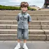 Conjunto de Verano para Niños 2026 Nuevo de Moda Genial Camisa de Mezclilla de Manga Corta para Niños Conjunto de Dos Piezas Ropa Infantil Transfronteriza