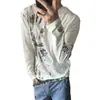 Colección de otoño transfronteriza nueva: Camiseta de manga larga con estampado moteado estilo americano para calle, unisex, moderna, top casual holgado