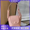 Mini Bolso de Color Sólido Estilo Coreano para Mujer 2026 Primavera Nueva Moda Elegante Bolso Silla de Montar Ligero Versátil Bolso para Auriculares