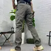 Pantalones tácticos para hombre de exportación transfronteriza del sudeste asiático para exteriores, con múltiples bolsillos, resistencia al desgaste, propiedades de secado rápido y adecuados para entrenamiento, montañismo, senderismo y trabajo.