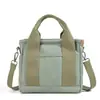 Bolso de lona de comercio exterior nuevo con gran capacidad y múltiples compartimentos, bolso de mano cruzado versátil y casual para el día a día y bolso de hombro para mujer