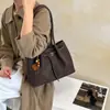 Bolsa de palha trançada super moderna para mulheres, novo estilo 2026, versátil, grande capacidade, bolsa de ombro, casual urbano, bolsa para o trabalho