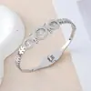 Estilo Europeu Transfronteiriço Moda Versátil Design de Nicho Estilo Simples Titânio Colorfast Inserido com Diamante Cor Dourada 18K Pulseira Atacado
