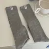 Meias Terry Grossas de Outono e Inverno Estilo Ins Cor Sólida Versátil Meia-Canela Meias Antiderrapantes para Mulheres Atacado