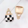 Set Mixto de 23 Accesorios para Manualidades: Bolsa de Perfume Estilo Chanel Blanco y Negro, Colgantes de Esmalte, Aretes de Aleación, Llaveros, Dijes Pequeños