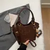 Bolso Pequeño Casual Simple para Mujer 2026 Primavera Nuevo Moda Bolso de Mano para Viaje Bolso Cubo Bolso Cruzado Elegante