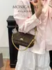 Bolsa de Hombro Nueva para Mujer Monica Qiqi Baellerry 2026 Primavera Transfronteriza Bolsa Réplica Transfronteriza