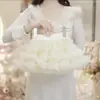 Conjunto de Tres Piezas para Niñas Primavera Temprana 2026: Camiseta de manga larga básica, Chaleco de punto calado, Falda de tutú, Atuendo de primavera moderno