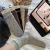 Calcetines de otoño e invierno para mujer con estampados florales y bordes rizados, calcetines de algodón de caña media, calcetines dulces versátiles estilo coreano para mujer, calcetines de algodón apilables