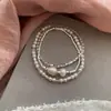 Coleção Pérola Estelar: Pulseira em Camadas de Pérola Rosa Nebulosa e Fragmento de Prata, Estilo de Luxo Leve Três Camadas de Alta Qualidade, Pulseira Delicada e Elegante